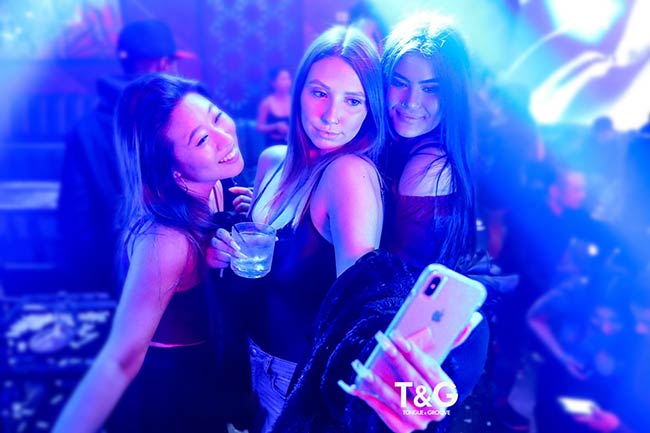 Friends enjoying a night at Tongue and Groove